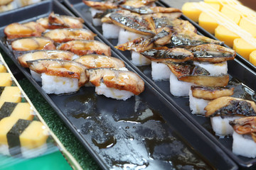 Sushi Japanese food choosing and take to home, People choose and take sushi to eating in home 