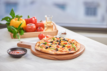 Appetizing homemade pizza on a white background