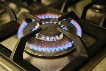 blue flames of gas stove