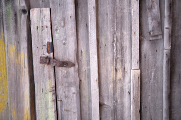 old wooden door with metal lock