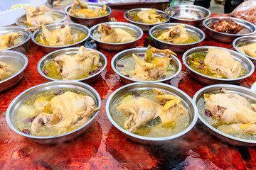 Delicious boiled chicken in bowl.Chinese food.