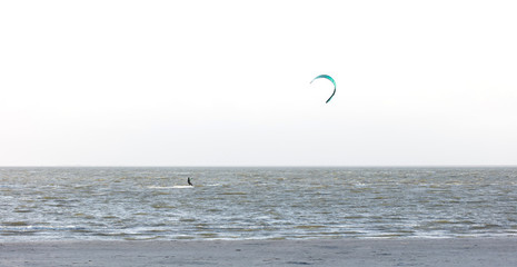 Kitesurfing on the waves