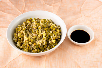 mung bean with white rice soup which is called Nokdujuk in Korea