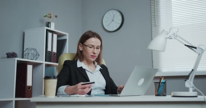 Online shopping, E-commerce, Sale, Consumerism, Electronic Payment, Technology Concept. Woman Using Laptop Device, Holding Credit Card, Buying Goods or Ordering Online