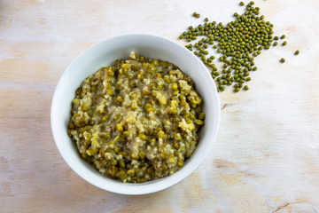 Mung bean with white rice soup which is called Nokdujuk in Korea