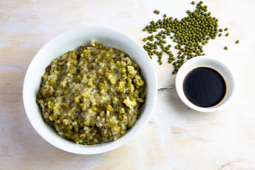 Mung bean with white rice soup which is called Nokdujuk in Korea