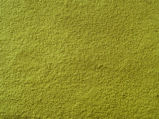 Fototapeta premium Powdered matcha green tea background, closeup