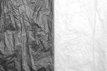 abstract background, texture of black and white crumpled plastic bag