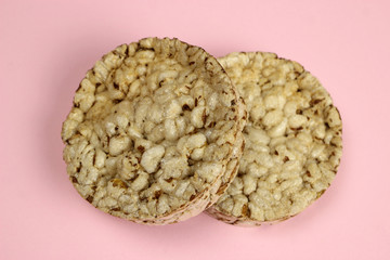 rice, buckwheat Crispbread on a pink background. Diet, proper nutrition, Vegan