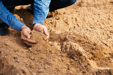 Farmers are checking the soil for planting.