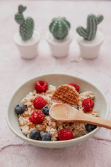 Delicious healthy breakfast - granola with berries on the table.