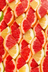 Pomelo and grapefruit slices background.