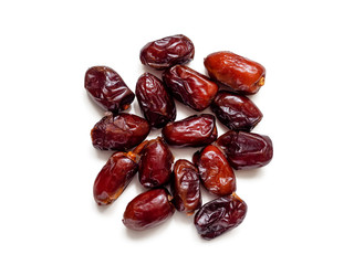 Handful of dried dates on a white background