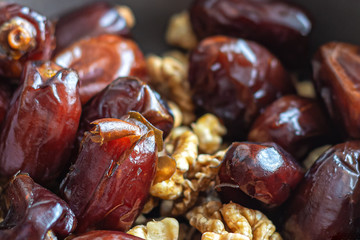 Dried dates and peeled walnuts