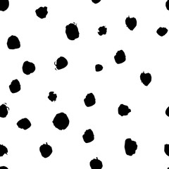 Seamless pattern with black dots.