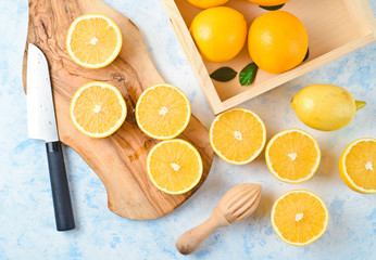 Healthy food, background, halves of oranges sliced for making orange juice