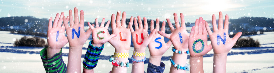 Children Hands Building Colorful Word Inclusion. Snowy Winter Background With Snowflakes
