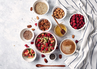 healthy breakfast oatmeal with raspberries, figs, chia and flax