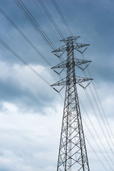 High voltage pole. Electrical power lines.
