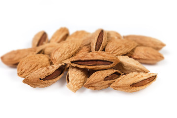 Unshelled almonds, close-up in selective focus