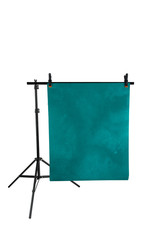 Obraz premium Portable background tripod holder isolated on white background. aluminum stand holder with blue green photo background