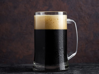 A mug of homemade dark stout beer