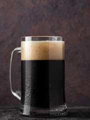 A mug of homemade dark stout beer