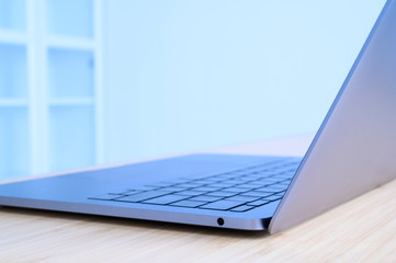 Laptop on the desk wooden with technology concept,copy space for text.