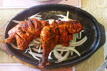 chicken tandoori served on the plate