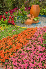 Fototapeta na wymiar Beautiful ornamental backyard flower garden. Natural background