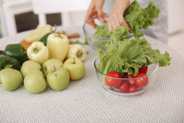 Healthy eating. Dieting and people concept. Brunette with a vegetable.