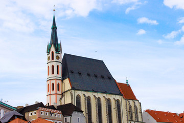 Fototapeta premium Facade of St. Vitus Church in Cesky Krumlov, Czech Republic, during a sunny day