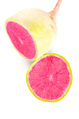Two half of sweet watermelon radish on a white isolated background - vegetarian food concept