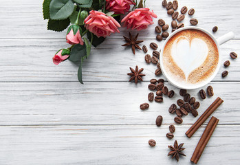 A cup of coffee with heart pattern