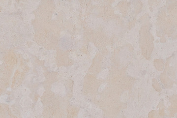 White surface texture of porous stone. Background of limestone an old worn out wall. Texture the surface of the Sandstone.