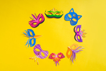 Carnival mask on yellow background 