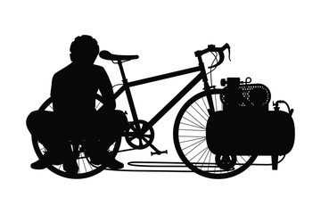 Young man with bike silhouette