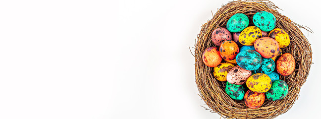 Stylish background with colorful quail, easter eggs with copy space for text isolated on white background. Flat lay, top view, mockup, overhead, template