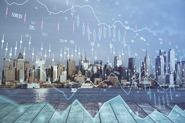 Forex graph on city view with skyscrapers background multi exposure. Financial analysis concept.