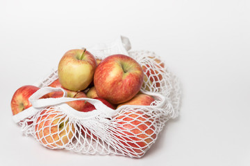 Shopping Handbag with apples, white background, Fresh fruit