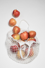 Shopping Handbag with apples, white background, Fresh fruit