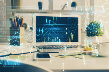 Forex market chart hologram and personal computer background. Double exposure. Concept of investment.