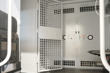 Car body interior with bars for transportation of arrested and imprisoned criminals