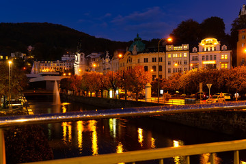 Fototapeta na wymiar Embankments of Karlovy Vary in evening, Czech Republic