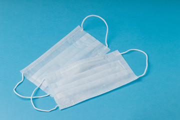 medical masks on a blue background.
