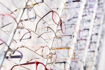 Glasses showcase in modern optic shop