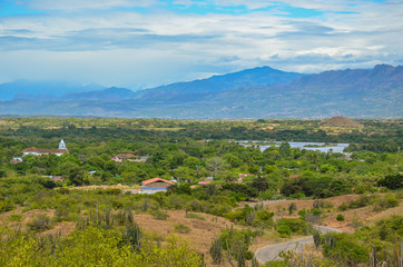 Fototapeta na wymiar panoramic view of a village by a river