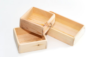 Empty wooden box. Made of pine, on a light white background.