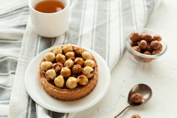 Hazelnut tartlet. Hazelnut. Gourmet dessert.