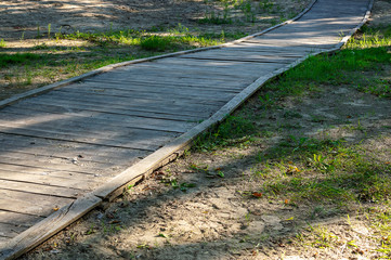 wooden walkway paved from boards.